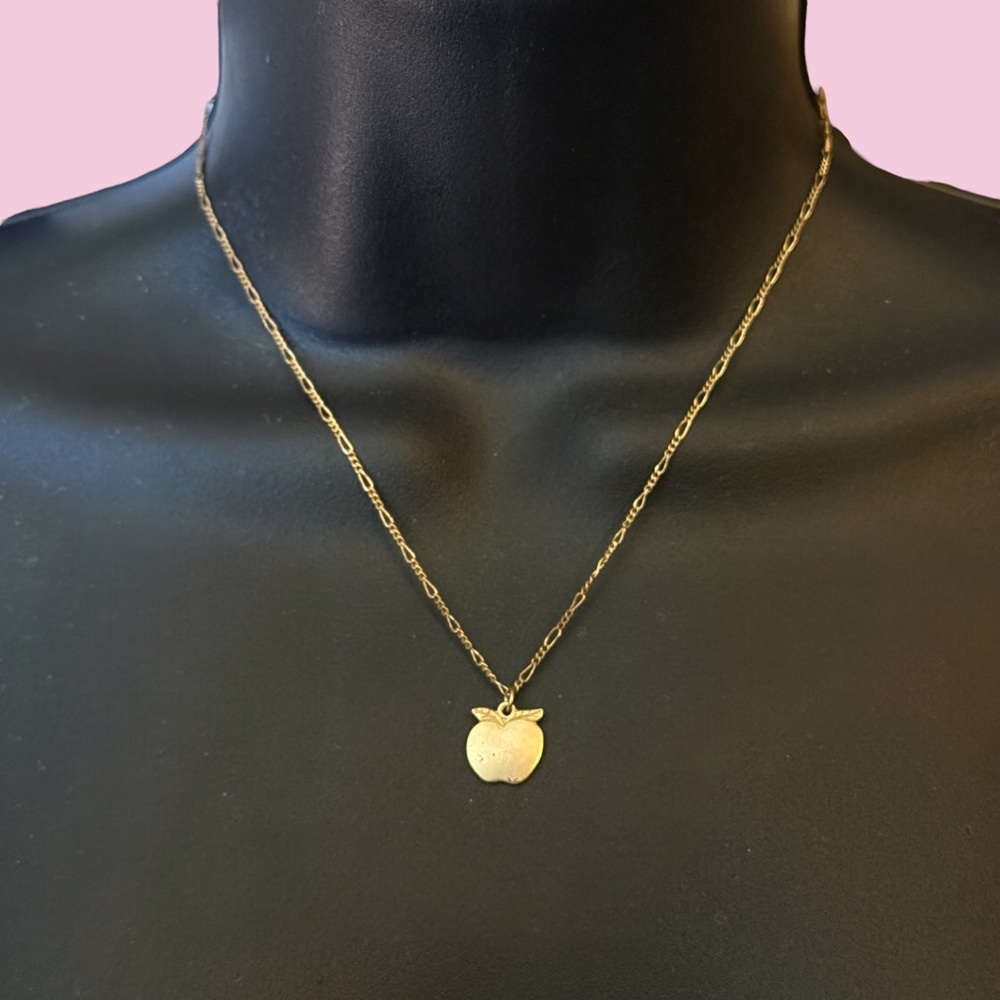 Gold tone apple pendant necklace